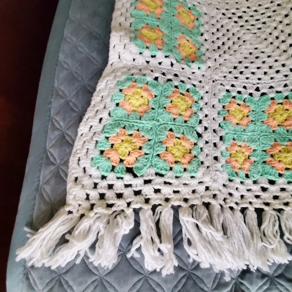 Handmade Crocheted White and green, peach colored yarn fringe throw blanket